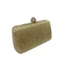 Clutch pedrería dorado